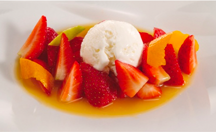 Orange strawberries with cream-flavoured ice cream